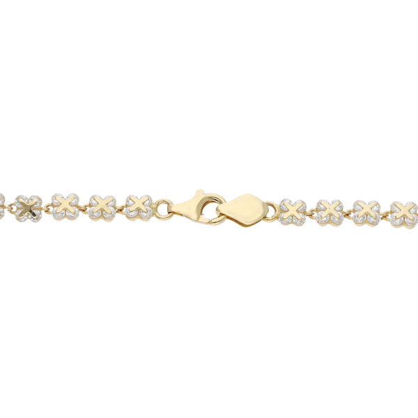 Pulsera eslabón encontrado con aplicaciones y sintéticos en oro amarillo 14 kilates.