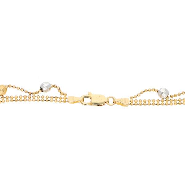 Pulsera eslabón boleado con aplicaciones en oro tres tonos 14 kilates.