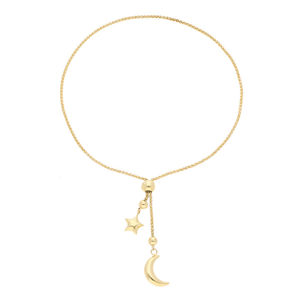 Pulsera eslabón tejido con colgantes motivo luna y estrella en oro amarillo 14 kilates.