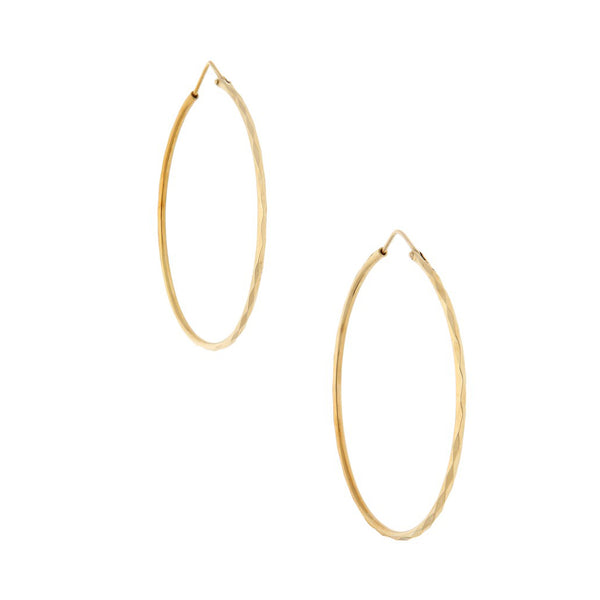 Arracadas facetadas en oro amarillo 14 kilates.