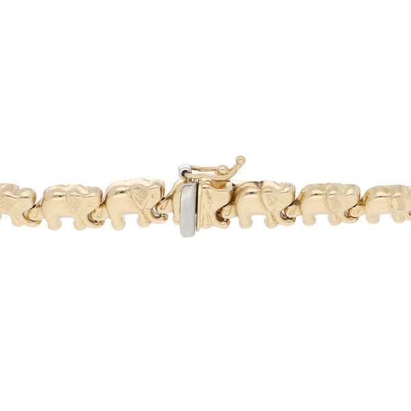 Pulsera eslabón hueco motivo elefante en oro amarillo 14 kilates.