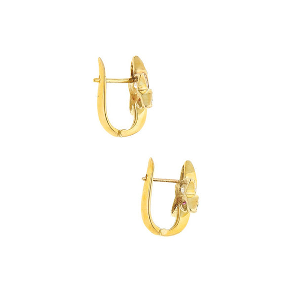 Aretes diseño especial motivo flor con sintéticos en oro amarillo 14 kilates.
