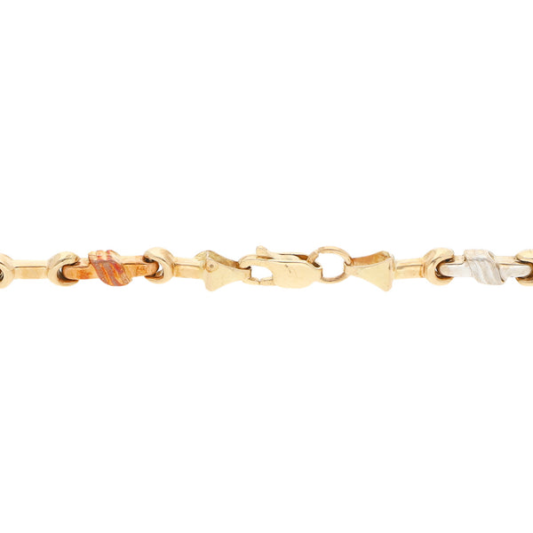 Pulsera eslabón articulado en oro tres tonos 14 kilates.