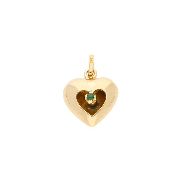 Dije hueco motivo corazón con sintético en oro amarillo 14 kilates.