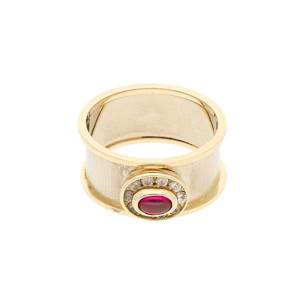 Anillo diseño especial con sintéticos en oro dos tonos 14 kilates.