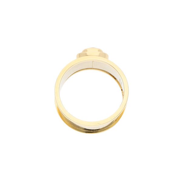 Anillo diseño especial con sintéticos en oro dos tonos 14 kilates.
