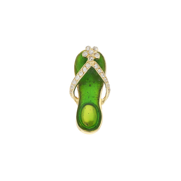 Dije diseño especial motivo sandalia con circonias y esmalte en oro amarillo 14 kilates.