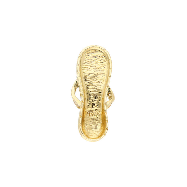 Dije diseño especial motivo sandalia con circonias y esmalte en oro amarillo 14 kilates.