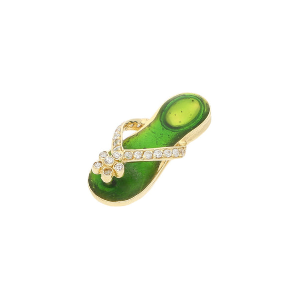 Dije diseño especial motivo sandalia con circonias y esmalte en oro amarillo 14 kilates.