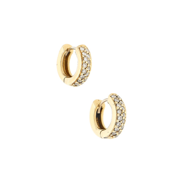 Arracadas articuladas con diamantes en oro amarillo 14 kilates.