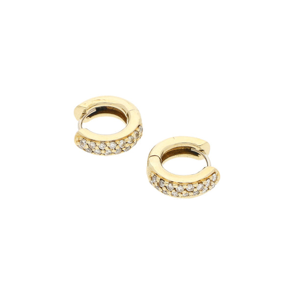 Arracadas articuladas con diamantes en oro amarillo 14 kilates.