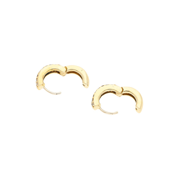 Arracadas articuladas con diamantes en oro amarillo 14 kilates.