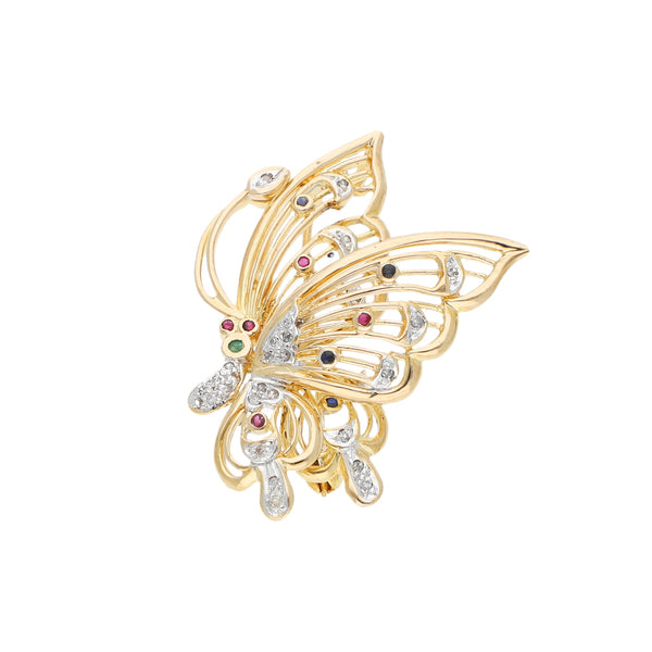 Prendedor calado motivo mariposa con diamantes y sintéticos en oro dos tonos 14 kilates.