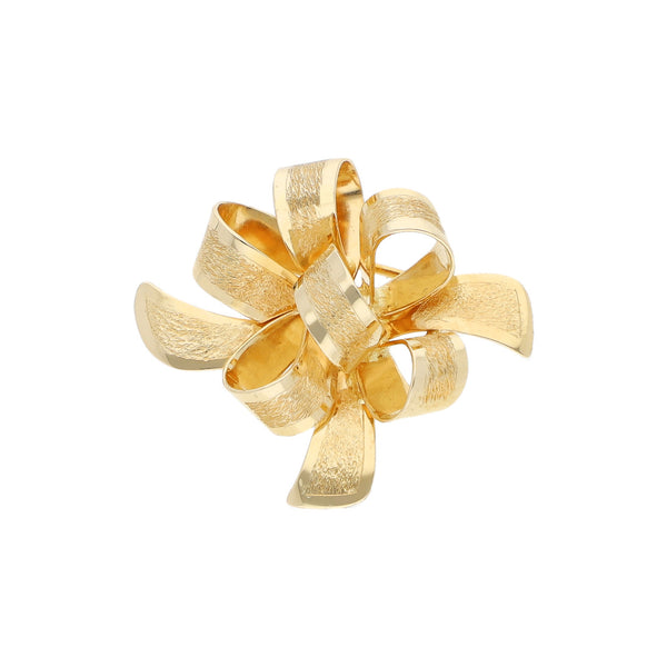 Prendedor diseño especial motivo moño en oro amarillo 14 kilates.