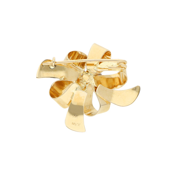 Prendedor diseño especial motivo moño en oro amarillo 14 kilates.