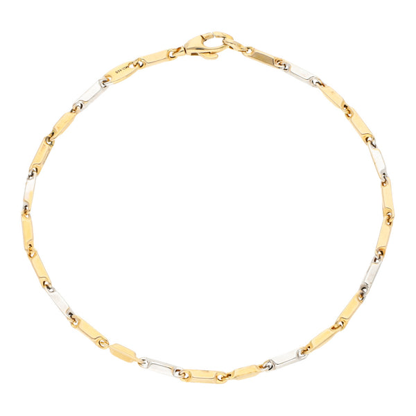 Pulsera eslabón cruzado en oro dos tonos 14 kilates.