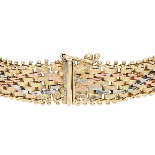 Pulsera eslabón boleado en oro tres tonos 14 kilates.