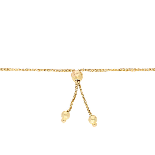 Pulsera eslabón tejido con aplicaciones en oro amarillo 14 kilates.