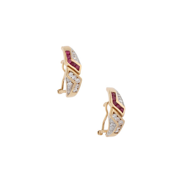 Aretes diseño especial con sintéticos en oro amarillo 14 kilates.