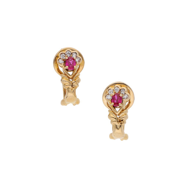 Aretes diseño especial con sintéticos en oro amarillo 14 kilates.