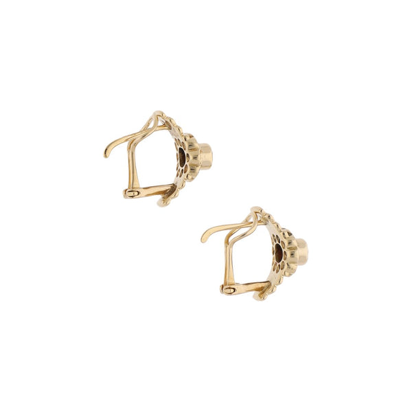 Aretes diseño especial con diamantes y rubí en oro amarillo 14 kilates.