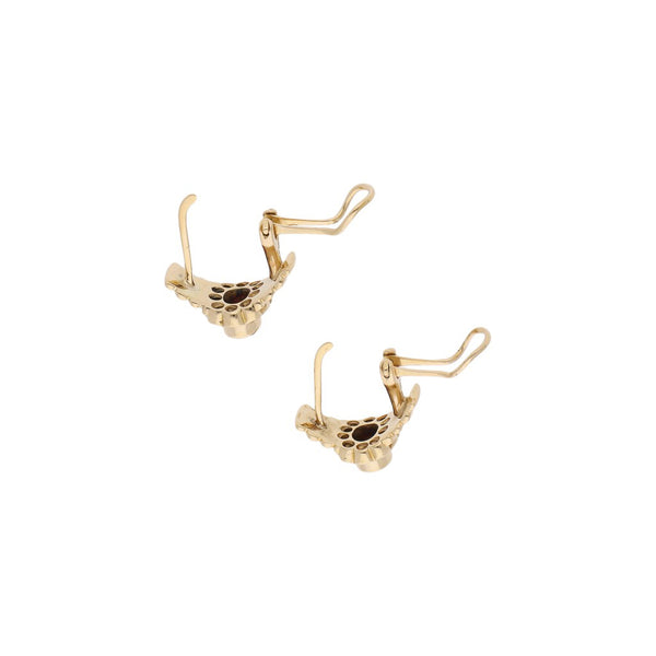 Aretes diseño especial con diamantes y rubí en oro amarillo 14 kilates.