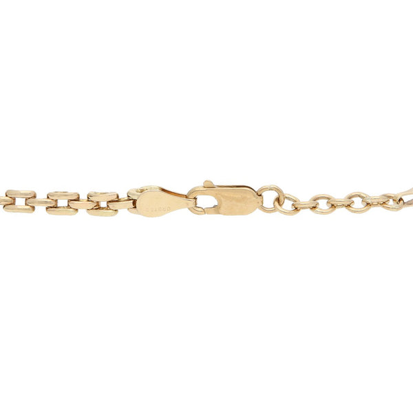 Pulsera eslabón articulado aplicación delfín en oro dos tonos 14 kilates.