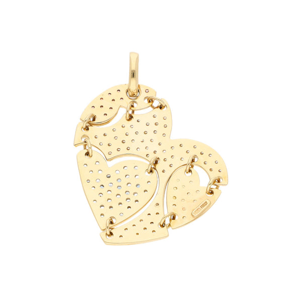 Dije diseño especial motivo corazón con sintéticos en oro amarillo 14 kilates.