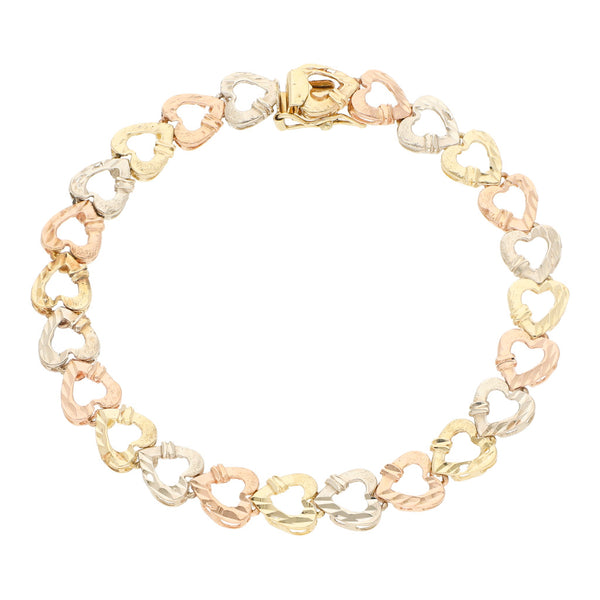 Pulsera eslabón labrado motivo corazón en oro tres tonos 14 kilates.
