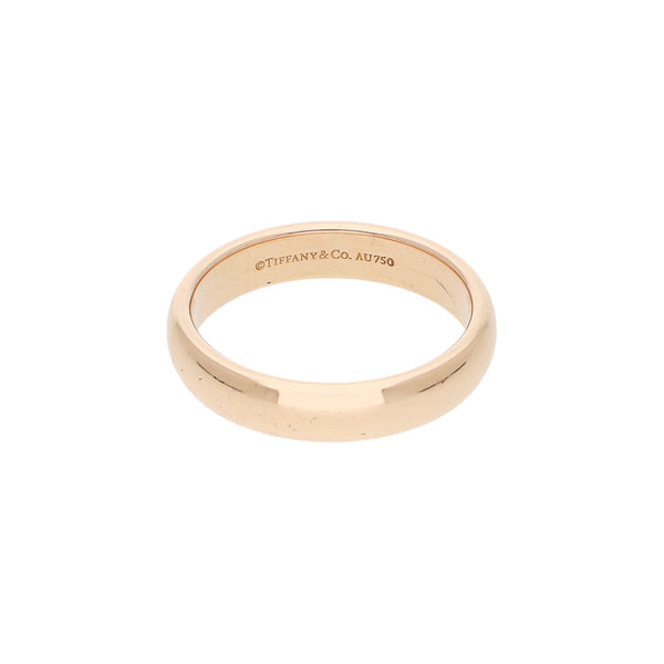 Argolla lisa firma Tiffany & Co. en oro rosa 18 kilates.