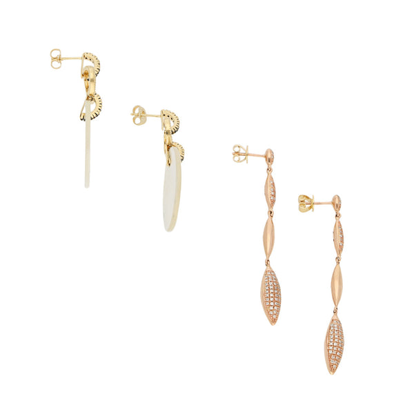 Dos aretes diseño especial con diamantes y sintéticos en oro dos tonos 14 kilates.
