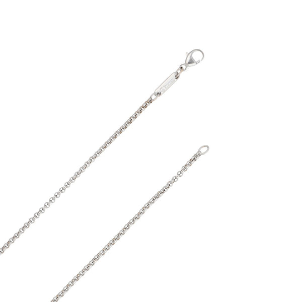 Gargantilla eslabón cruzado y dije diseño especial firma Chopard motivo corazón con diamante flotante en oro blanco 18 kilates.