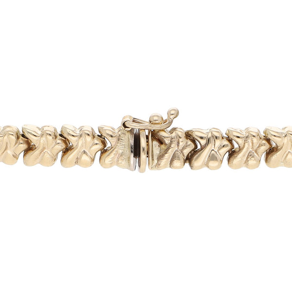 Pulsera eslabón articulado en oro amarillo 14 kilates.