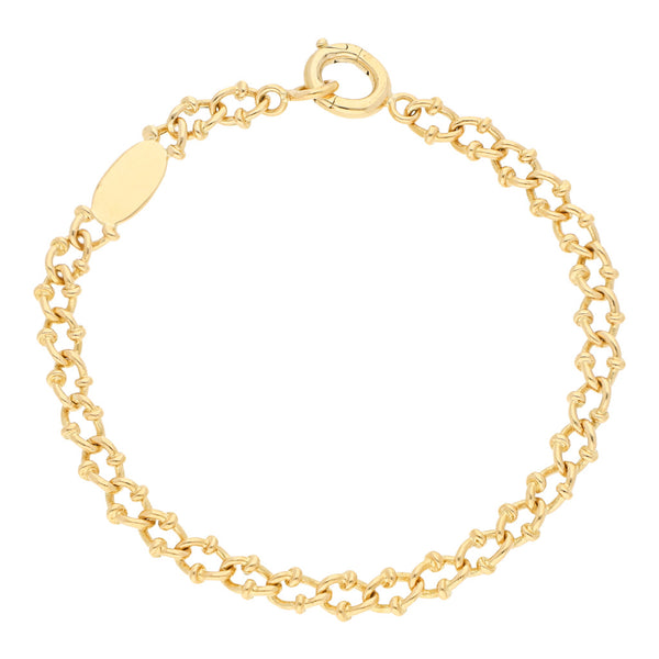 Pulsera eslabón encontrado firma Tane en oro amarillo 18 kilates.