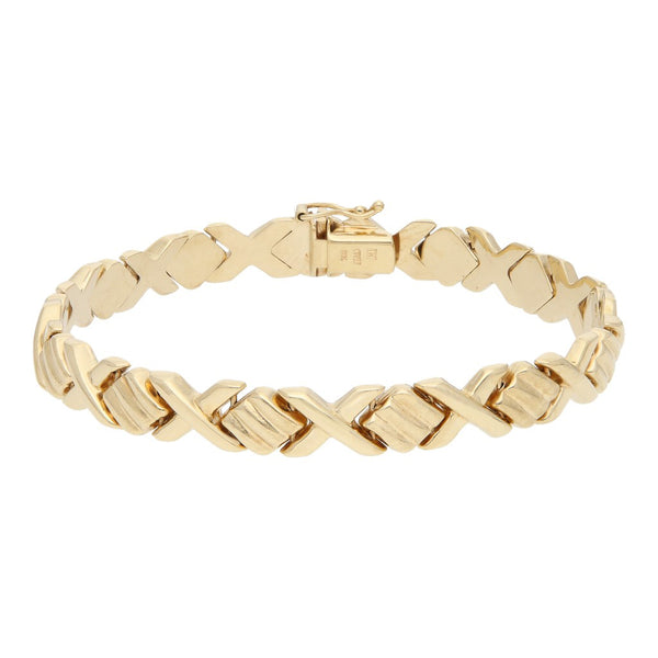 Pulsera eslabón XOXO en oro amarillo 14 kilates.