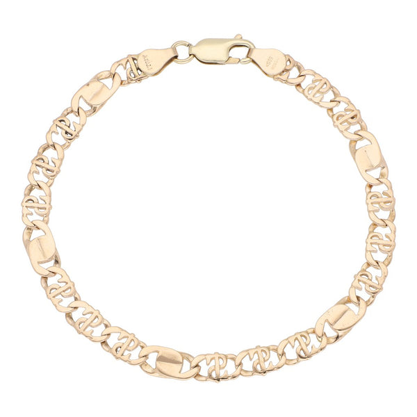 Pulsera eslabón combinado en oro amarillo 14 kilates.