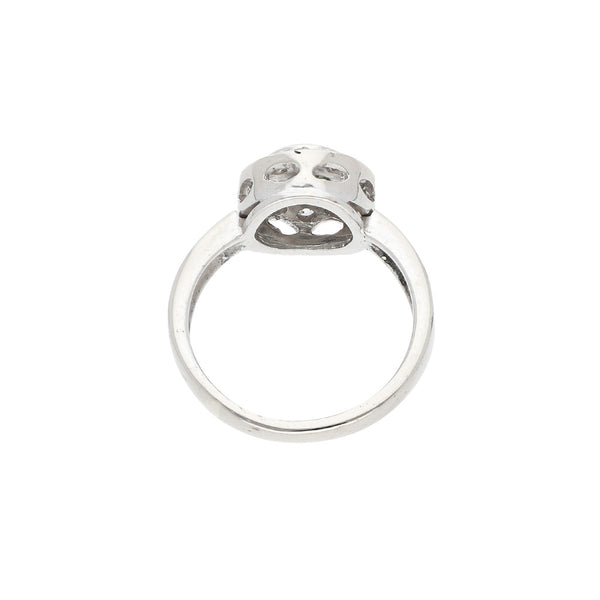 Anillo diseño especial con sintéticos en oro blanco 14 kilates.