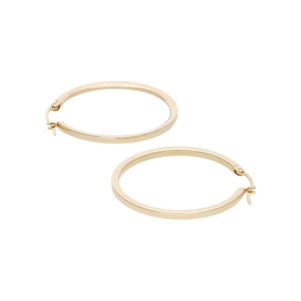 Arracadas lisas en oro amarillo 14 kilates.