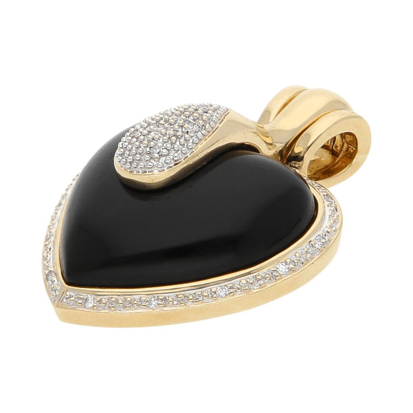 Dije diseño especial motivo corazón con diamantes y ónix en oro amarillo 14 kilates.