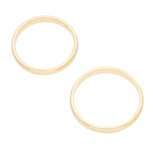 Dos argollas lisas en oro amarillo 14 y 12 kilates.