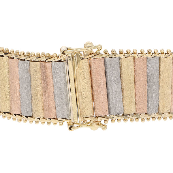Pulsera eslabón boleado en oro tres tonos 14 kilates.