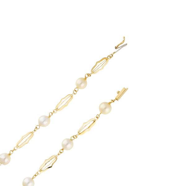 Collar eslabón combinado con perlas en oro amarillo 14 kilates.