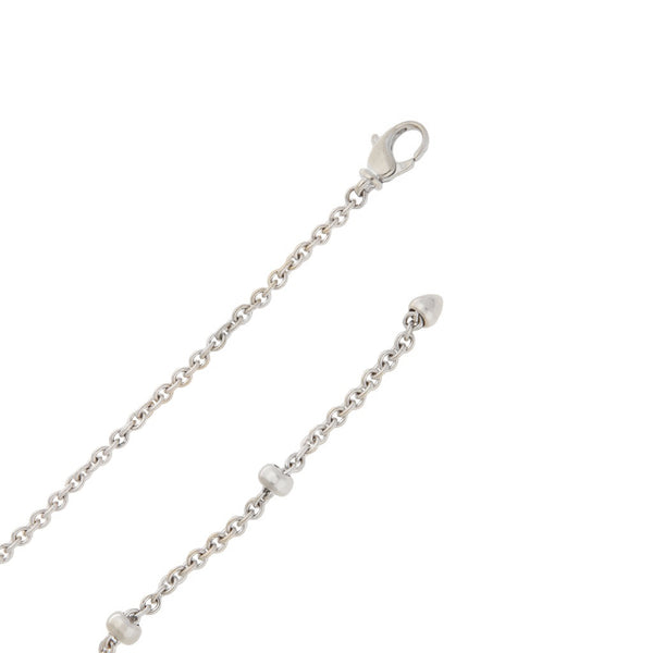 Juego de collar eslabón cruzado y dije diseño especial motivo pez en acero y oro firma Bvlgari en oro de dos tonos 18 kilates.