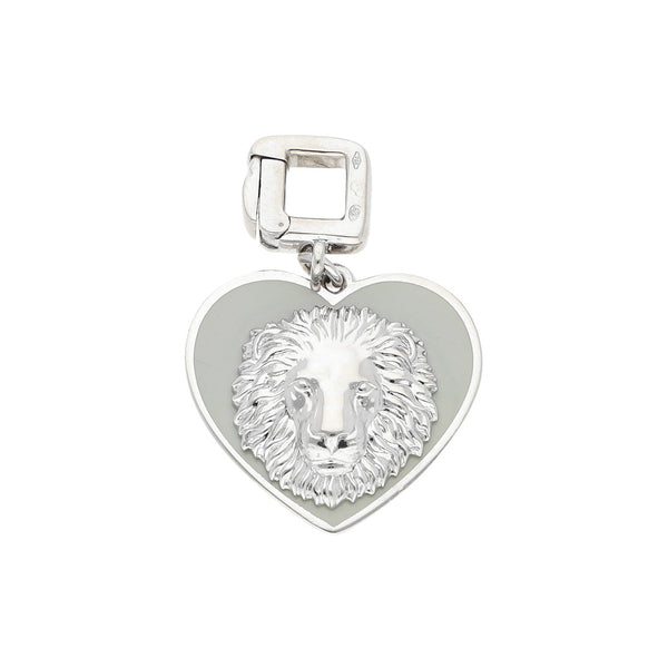 Dije diseño especial motivo corazón con esmalte,zafiro,aplicación motivo león firma Louis Vuitton en oro blanco 18 kilates.