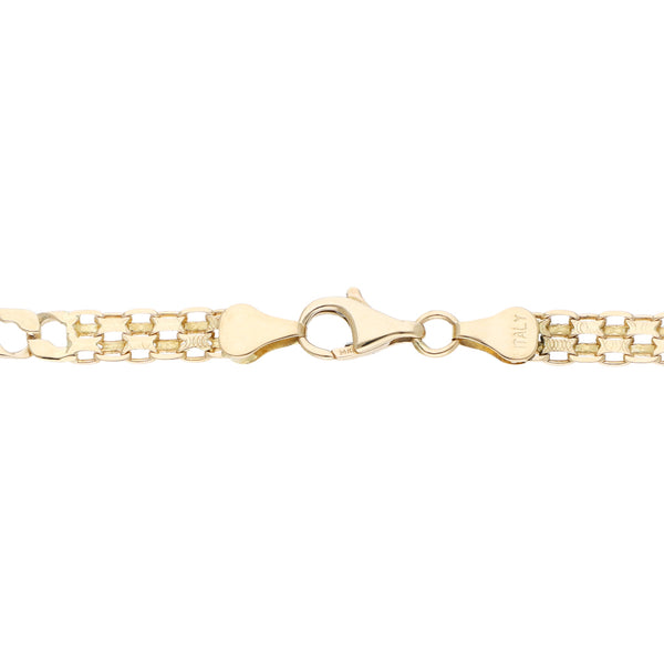 Pulsera eslabón combinado en oro amarillo 14 kilates.