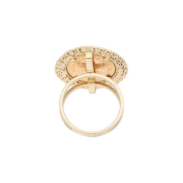 Anillo boleado con aplicación de moneda de dos y medio pesos en oro mexicano 21.6 kilates en oro amarillo 14 kilates.