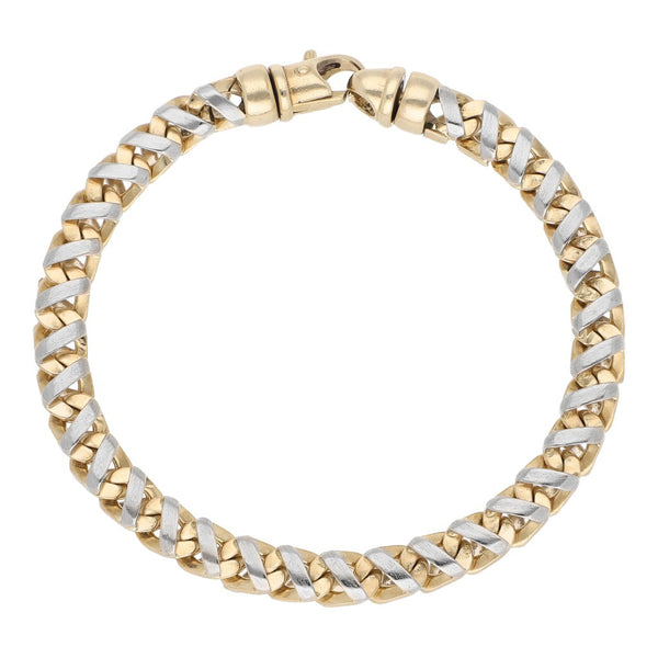 Pulsera eslabón tejido en oro dos tonos 14 kilates.