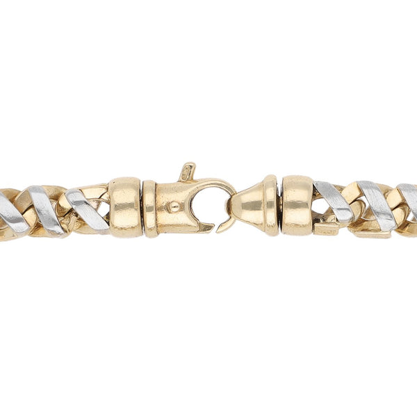 Pulsera eslabón tejido en oro dos tonos 14 kilates.