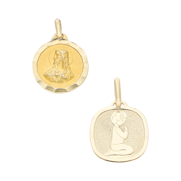 Dos medallas infantiles diseño especial motivo Sagrado Corazón y Primera Comunión en oro amarillo 14 kilates.
