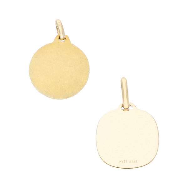 Dos medallas infantiles diseño especial motivo Sagrado Corazón y Primera Comunión en oro amarillo 14 kilates.